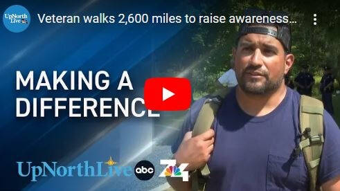 Thumbnail of a video featuring a man wearing a backpack outdoors with text "MAKING A DIFFERENCE" and logos for UpNorthLive, abc, and 74.